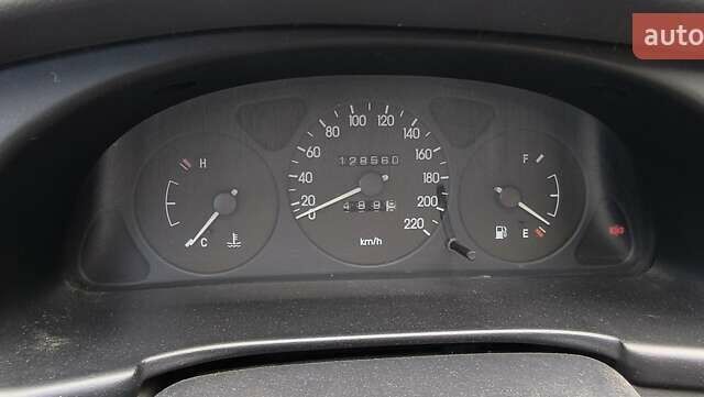 Красный Дэу Ланос, объемом двигателя 1.5 л и пробегом 128 тыс. км за 3550 $, фото 5 на Automoto.ua