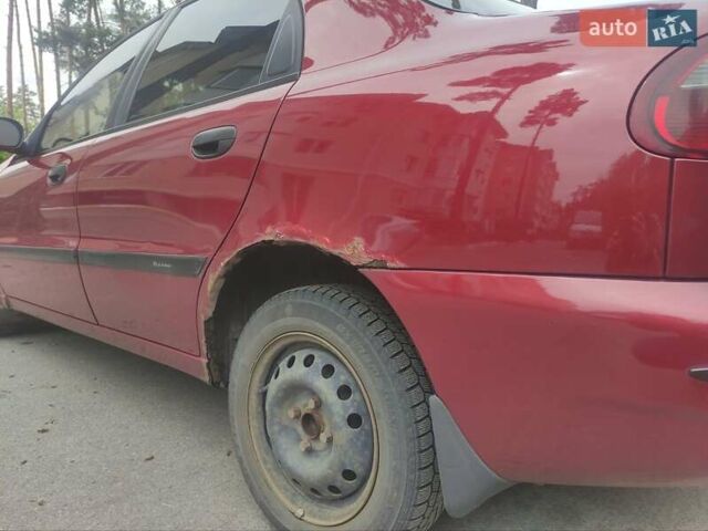 Красный Дэу Ланос, объемом двигателя 1.6 л и пробегом 186 тыс. км за 2200 $, фото 6 на Automoto.ua