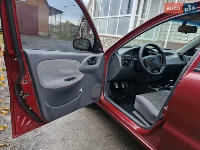 Красный Дэу Ланос, объемом двигателя 1.6 л и пробегом 163 тыс. км за 2650 $, фото 13 на Automoto.ua