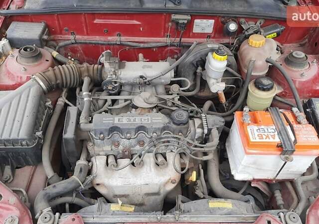 Красный Дэу Ланос, объемом двигателя 1.5 л и пробегом 151 тыс. км за 1299 $, фото 8 на Automoto.ua