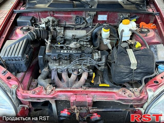 Красный Дэу Ланос, объемом двигателя 1.5 л и пробегом 290 тыс. км за 1950 $, фото 11 на Automoto.ua