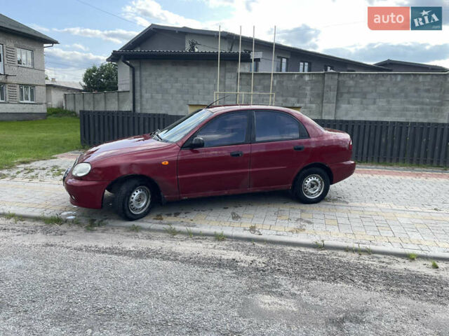 Красный Дэу Ланос, объемом двигателя 1.5 л и пробегом 250 тыс. км за 1150 $, фото 2 на Automoto.ua