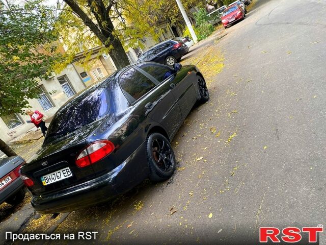 Красный Дэу Ланос, объемом двигателя 1.5 л и пробегом 116 тыс. км за 3500 $, фото 8 на Automoto.ua