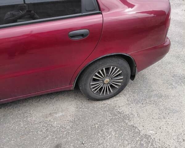 Красный Дэу Ланос, объемом двигателя 1.5 л и пробегом 309 тыс. км за 2000 $, фото 11 на Automoto.ua