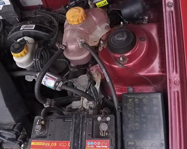 Червоний Деу Ланос, об'ємом двигуна 1.3 л та пробігом 220 тис. км за 1850 $, фото 46 на Automoto.ua