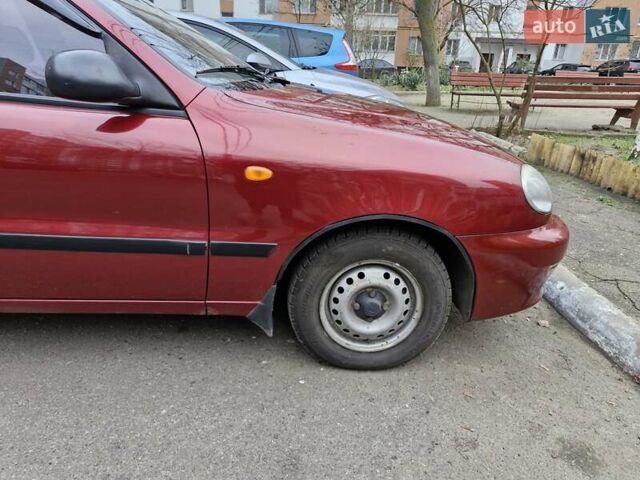Красный Дэу Ланос, объемом двигателя 1.5 л и пробегом 146 тыс. км за 2300 $, фото 11 на Automoto.ua