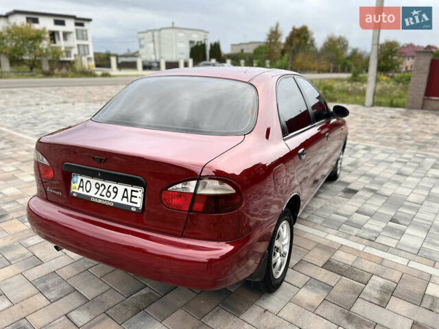 Красный Дэу Ланос, объемом двигателя 1.5 л и пробегом 250 тыс. км за 1950 $, фото 27 на Automoto.ua