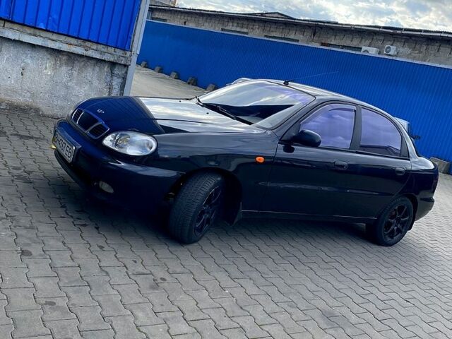 Красный Дэу Ланос, объемом двигателя 1.5 л и пробегом 116 тыс. км за 3500 $, фото 3 на Automoto.ua