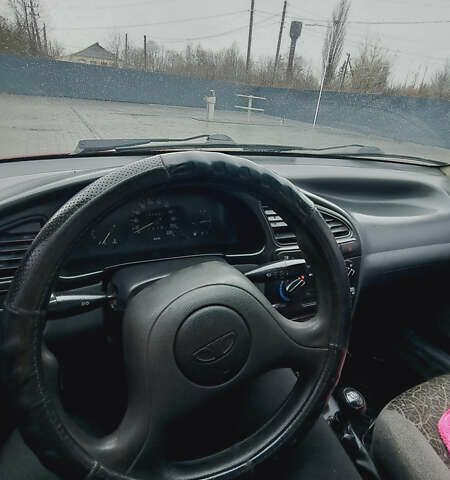 Красный Дэу Ланос, объемом двигателя 1.5 л и пробегом 153 тыс. км за 2000 $, фото 7 на Automoto.ua