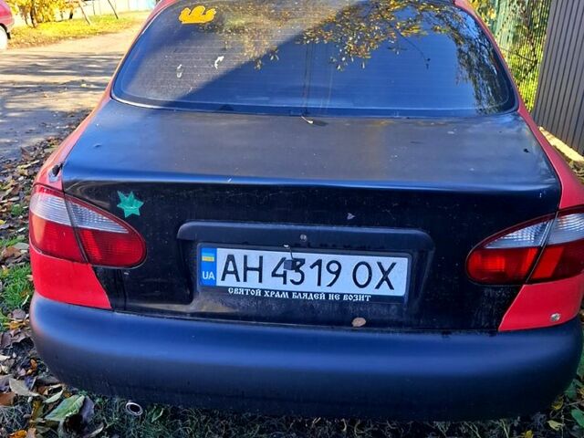 Деу Ланос 2006 у Смеле на Automoto.ua Червоний Деу Ланос, об'ємом двигуна 1.5 л та пробігом 316 тис. км за 1000 $, фото 8 на Automoto.ua