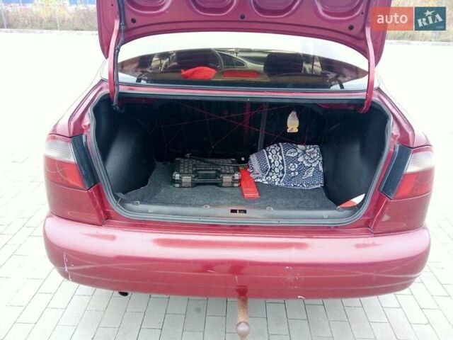 Красный Дэу Ланос, объемом двигателя 1.5 л и пробегом 322 тыс. км за 2300 $, фото 13 на Automoto.ua