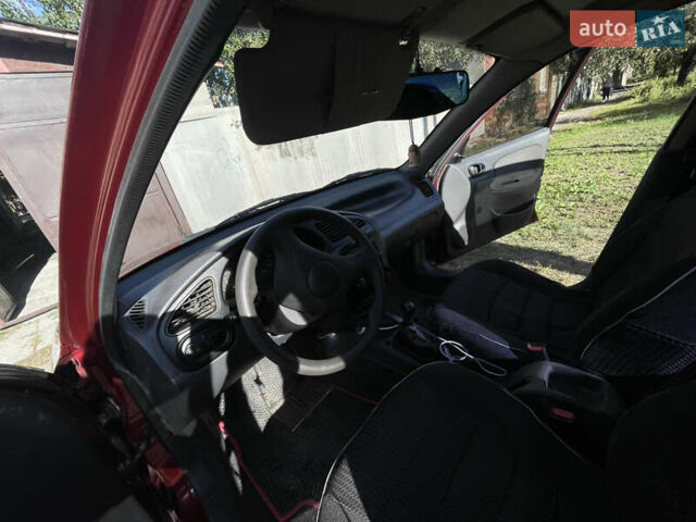 Червоний Деу Ланос, об'ємом двигуна 1.5 л та пробігом 309 тис. км за 2300 $, фото 7 на Automoto.ua