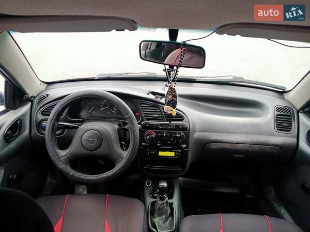 Красный Дэу Ланос, объемом двигателя 1.5 л и пробегом 322 тыс. км за 2300 $, фото 6 на Automoto.ua