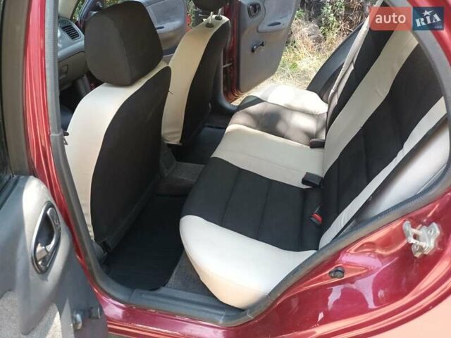 Красный Дэу Ланос, объемом двигателя 1.6 л и пробегом 304 тыс. км за 2900 $, фото 7 на Automoto.ua