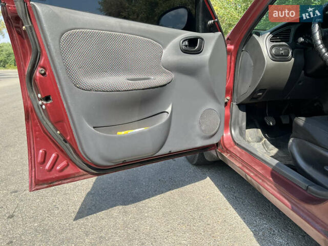 Красный Дэу Ланос, объемом двигателя 1.5 л и пробегом 158 тыс. км за 2500 $, фото 8 на Automoto.ua