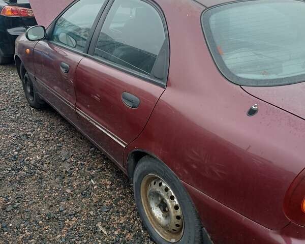 Красный Дэу Ланос, объемом двигателя 1.5 л и пробегом 501 тыс. км за 2400 $, фото 3 на Automoto.ua