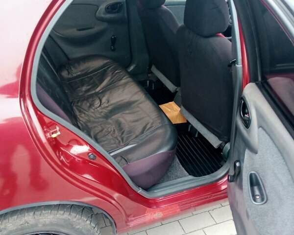 Красный Дэу Ланос, объемом двигателя 1.5 л и пробегом 322 тыс. км за 2300 $, фото 8 на Automoto.ua