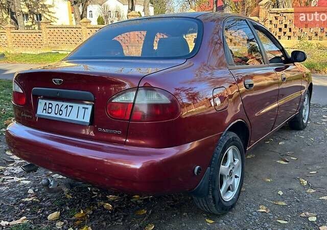 Красный Дэу Ланос, объемом двигателя 1.6 л и пробегом 216 тыс. км за 1900 $, фото 8 на Automoto.ua