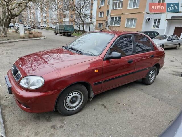 Красный Дэу Ланос, объемом двигателя 1.5 л и пробегом 146 тыс. км за 2300 $, фото 3 на Automoto.ua
