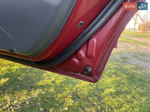 Красный Дэу Ланос, объемом двигателя 1.5 л и пробегом 300 тыс. км за 2999 $, фото 9 на Automoto.ua