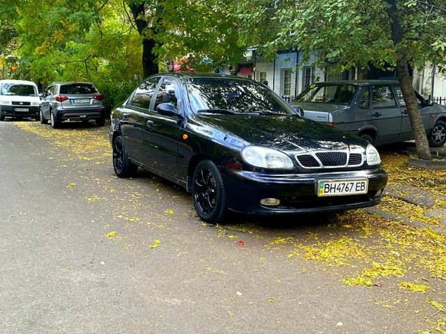 Красный Дэу Ланос, объемом двигателя 1.5 л и пробегом 116 тыс. км за 3500 $, фото 5 на Automoto.ua