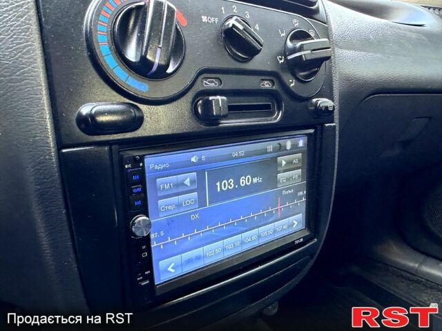 Красный Дэу Ланос, объемом двигателя 1.5 л и пробегом 290 тыс. км за 1950 $, фото 7 на Automoto.ua