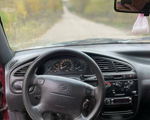 Красный Дэу Ланос, объемом двигателя 1.5 л и пробегом 210 тыс. км за 1700 $, фото 7 на Automoto.ua