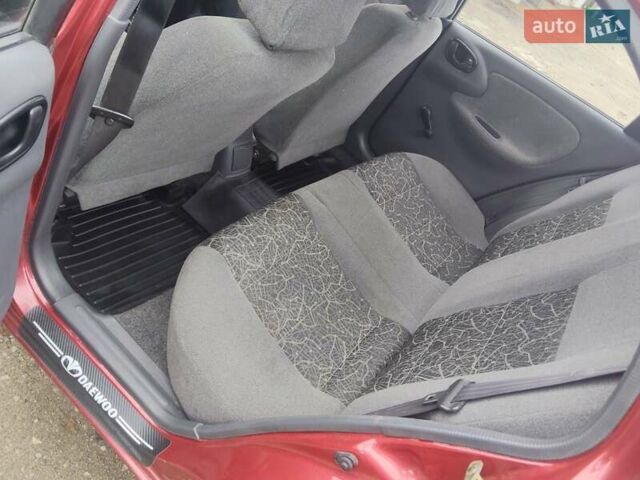 Красный Дэу Ланос, объемом двигателя 1.5 л и пробегом 152 тыс. км за 3150 $, фото 10 на Automoto.ua