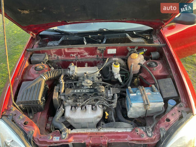 Красный Дэу Ланос, объемом двигателя 1.5 л и пробегом 300 тыс. км за 2999 $, фото 13 на Automoto.ua