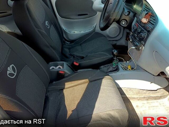 Червоний Деу Ланос, об'ємом двигуна 1.5 л та пробігом 150 тис. км за 1300 $, фото 3 на Automoto.ua