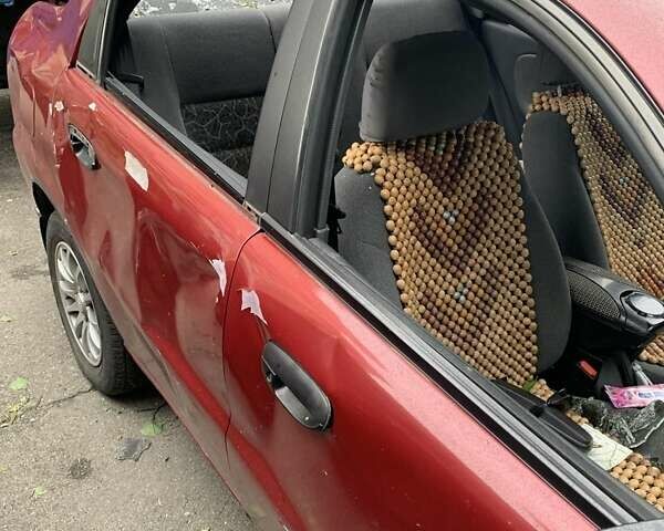 Красный Дэу Ланос, объемом двигателя 1.5 л и пробегом 120 тыс. км за 1600 $, фото 3 на Automoto.ua