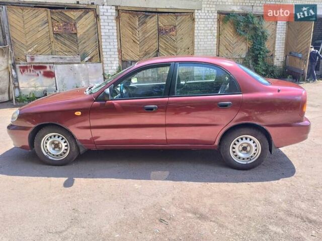 Красный Дэу Ланос, объемом двигателя 1.5 л и пробегом 255 тыс. км за 2200 $, фото 3 на Automoto.ua