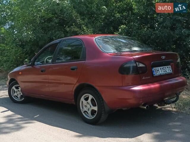 Красный Дэу Ланос, объемом двигателя 1.6 л и пробегом 304 тыс. км за 2900 $, фото 11 на Automoto.ua