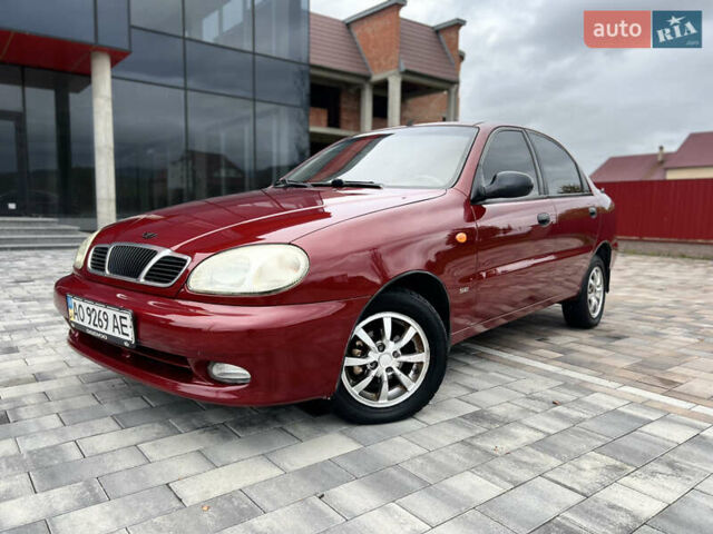 Красный Дэу Ланос, объемом двигателя 1.5 л и пробегом 250 тыс. км за 1950 $, фото 2 на Automoto.ua