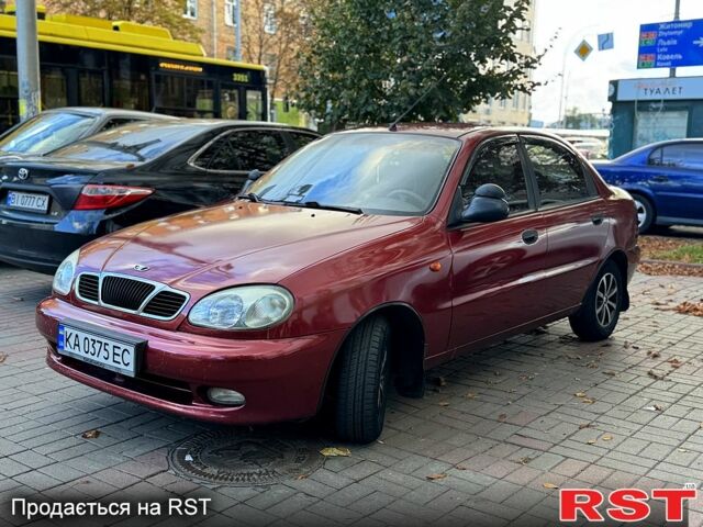 Красный Дэу Ланос, объемом двигателя 1.5 л и пробегом 290 тыс. км за 1950 $, фото 3 на Automoto.ua