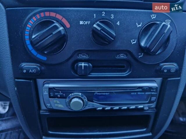 Красный Дэу Ланос, объемом двигателя 1.6 л и пробегом 163 тыс. км за 2650 $, фото 5 на Automoto.ua