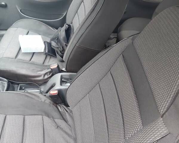 Красный Дэу Ланос, объемом двигателя 1.5 л и пробегом 309 тыс. км за 2000 $, фото 6 на Automoto.ua