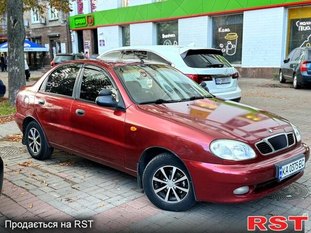 Красный Дэу Ланос, объемом двигателя 1.5 л и пробегом 290 тыс. км за 1950 $, фото 1 на Automoto.ua