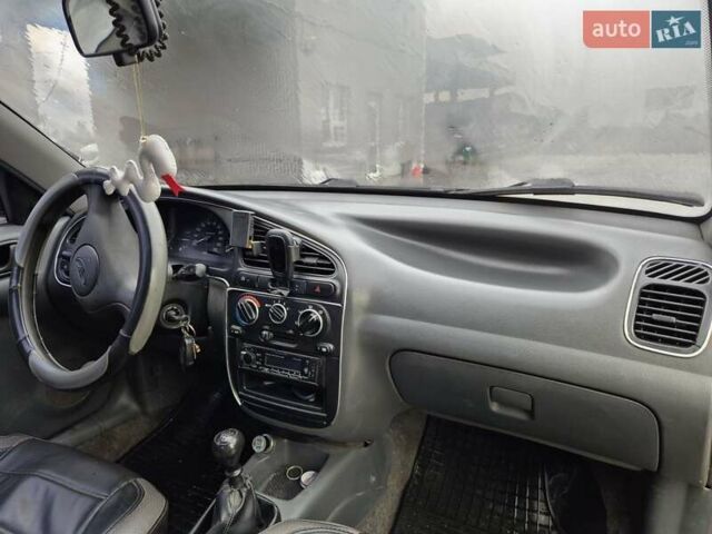 Красный Дэу Ланос, объемом двигателя 1.5 л и пробегом 183 тыс. км за 2700 $, фото 2 на Automoto.ua