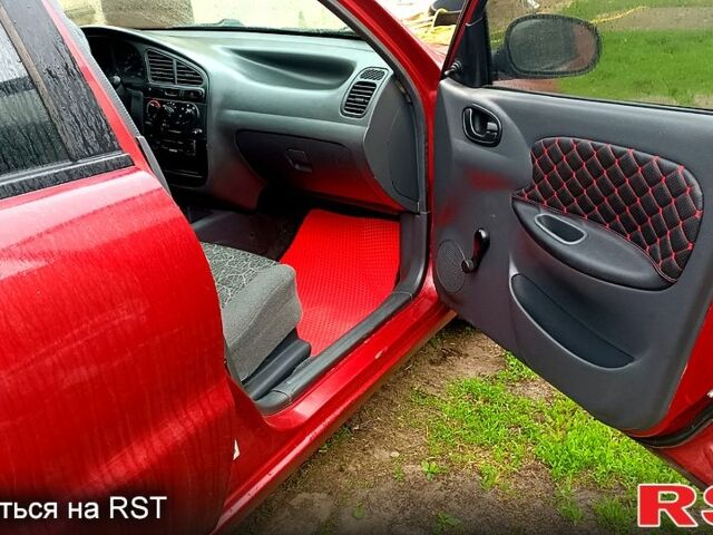 Красный Дэу Ланос, объемом двигателя 1.5 л и пробегом 163 тыс. км за 2200 $, фото 6 на Automoto.ua