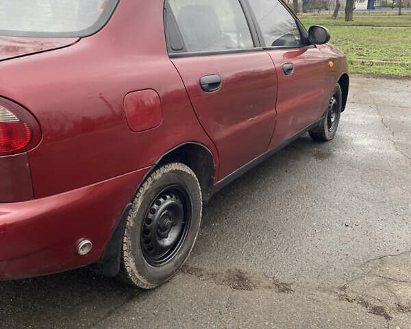 Красный Дэу Ланос, объемом двигателя 1.5 л и пробегом 250 тыс. км за 1450 $, фото 3 на Automoto.ua