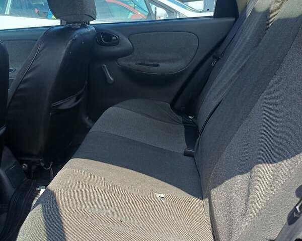 Красный Дэу Ланос, объемом двигателя 1.5 л и пробегом 501 тыс. км за 2400 $, фото 13 на Automoto.ua