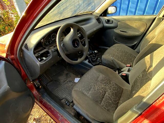 Червоний Деу Ланос, об'ємом двигуна 1.5 л та пробігом 126 тис. км за 1000 $, фото 4 на Automoto.ua