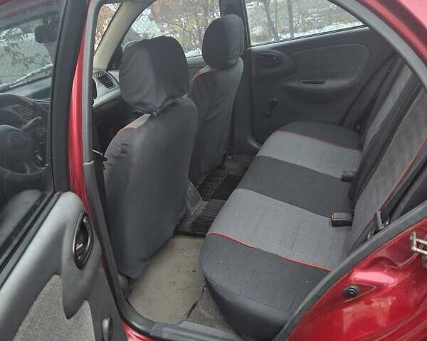 Червоний Деу Ланос, об'ємом двигуна 1.5 л та пробігом 350 тис. км за 1300 $, фото 2 на Automoto.ua