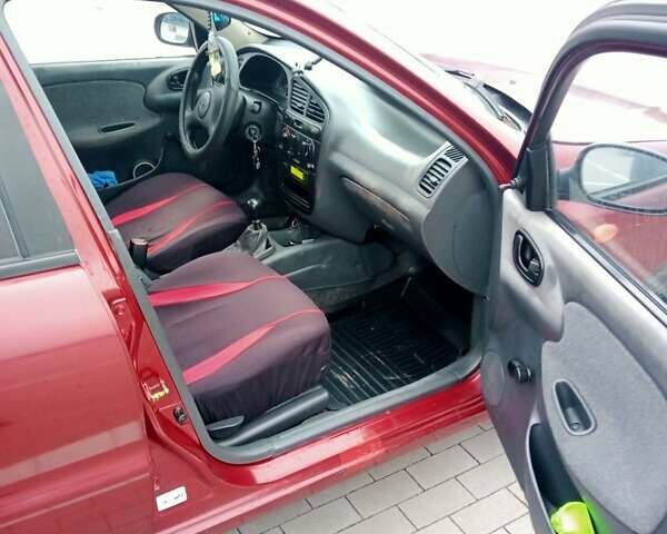 Красный Дэу Ланос, объемом двигателя 1.5 л и пробегом 322 тыс. км за 2300 $, фото 11 на Automoto.ua