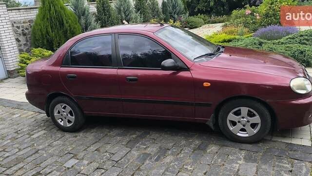 Красный Дэу Ланос, объемом двигателя 1.5 л и пробегом 128 тыс. км за 3550 $, фото 4 на Automoto.ua