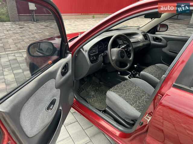 Красный Дэу Ланос, объемом двигателя 1.5 л и пробегом 250 тыс. км за 1950 $, фото 15 на Automoto.ua