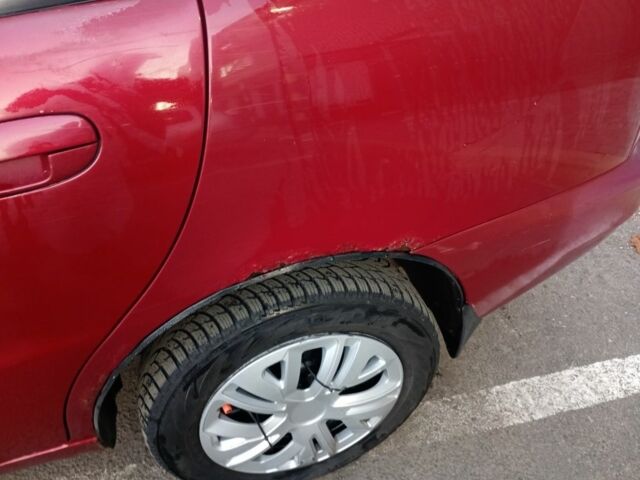 Красный Дэу Ланос, объемом двигателя 1.5 л и пробегом 175 тыс. км за 1000 $, фото 9 на Automoto.ua