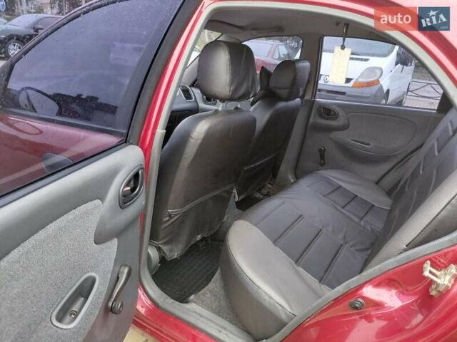 Красный Дэу Ланос, объемом двигателя 1.5 л и пробегом 183 тыс. км за 2850 $, фото 17 на Automoto.ua