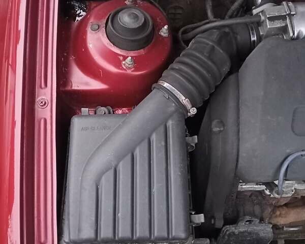 Червоний Деу Ланос, об'ємом двигуна 1.3 л та пробігом 220 тис. км за 1850 $, фото 47 на Automoto.ua